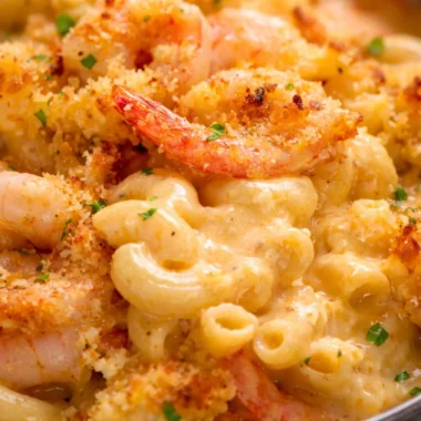 Garlic Shrimp Gratin topped with crispy breadcrumbs and served in a casserole dish.