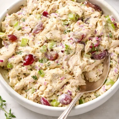 Delicious chicken salad with celery, grapes, and herbs for sandwich filling or salad.