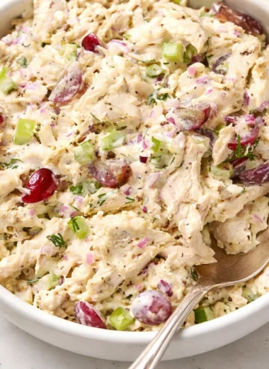 Delicious chicken salad with celery, grapes, and herbs for sandwich filling or salad.