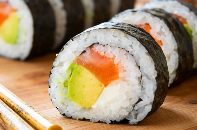 Easy sushi roll recipe at home with customizable ingredients and sushi rice.