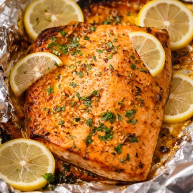 Garlic Butter Baked Salmon served with asparagus, ready in 20 minutes.