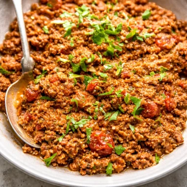 Delicious crockpot taco meat made with ground beef, salsa, and taco seasoning.