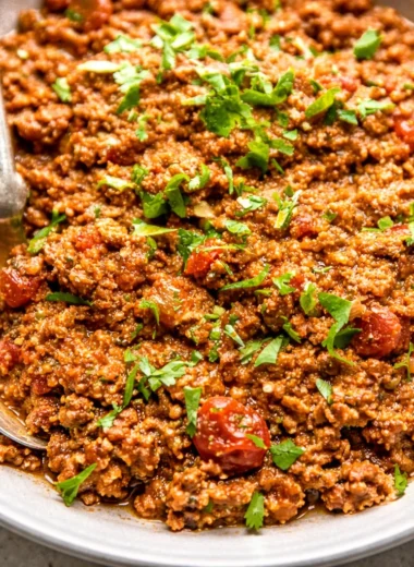 Delicious crockpot taco meat made with ground beef, salsa, and taco seasoning.