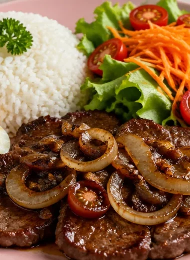 Savory garlic butter steak plate with rice and fresh salad