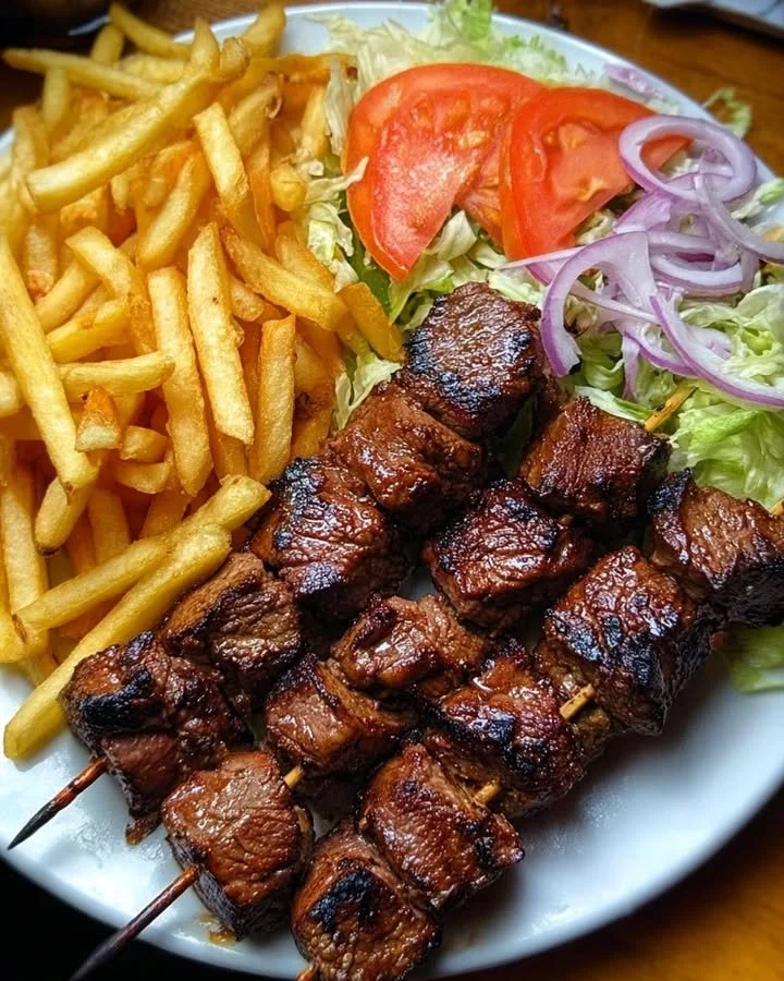 Crispy Grilled Beef Skewers with Fries and Garden Salad