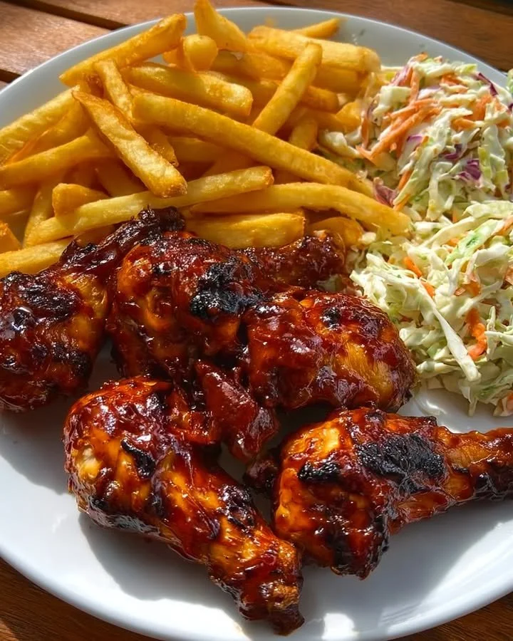 Sticky BBQ Chicken Drumsticks with Seasoned Fries & Creamy Coleslaw
