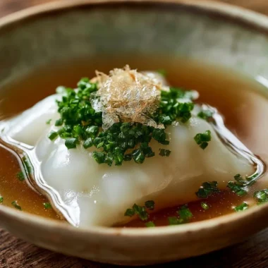 Crispy Maultaschen pockets filled with savory ingredients on a plate.
