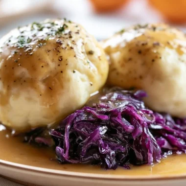 Golden German potato dumplings served with a rich sauce