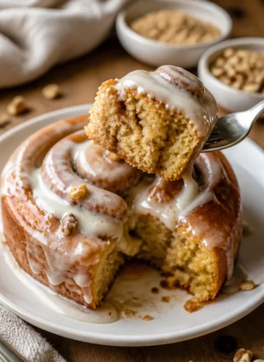 Delicious Pumpkin Spice Cinnamon Rolls topped with creamy icing